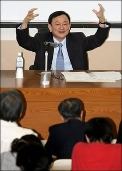 thaksingesturing.jpg