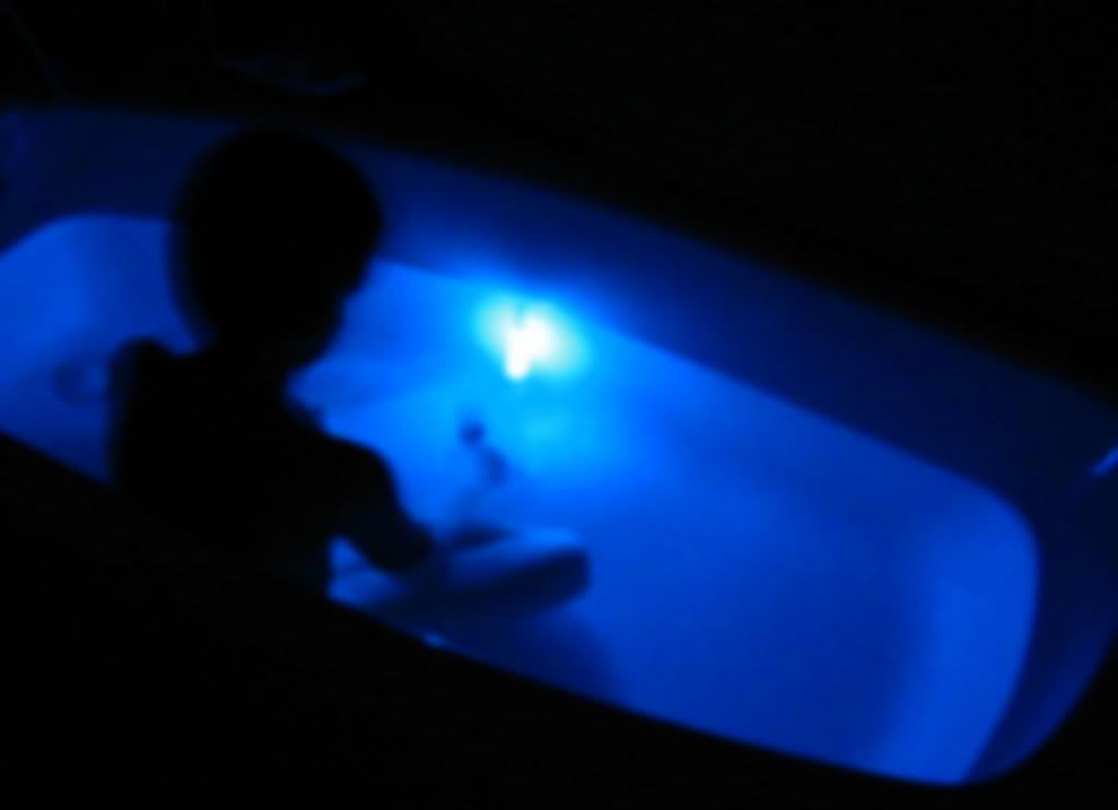 Boy_Bathing_With_Glow_Stick_.jpg
