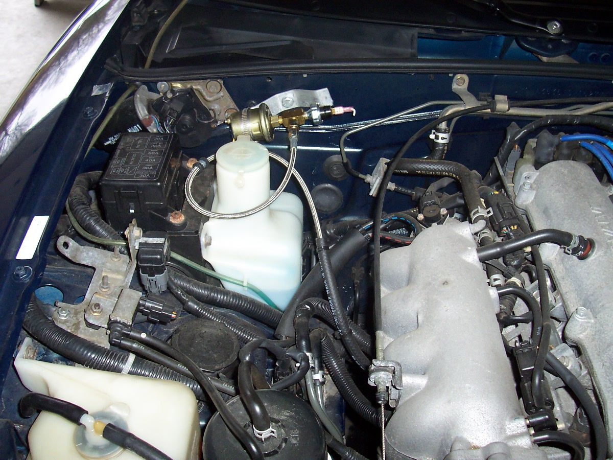 Help me find a small replacement washer fluid reservoir for my Miata ...